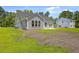 Backyard with a lawn and gray house siding at 306 Mizell Rd, Dorchester, SC 29437