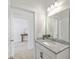 Bathroom with granite countertop sink and view to the hall at 306 Mizell Rd, Dorchester, SC 29437