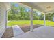 Spacious front porch with ample space for outdoor seating and clear view of the professionally landscaped yard at 306 Mizell Rd, Dorchester, SC 29437