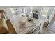 Open-concept living room featuring hardwood floors, fireplace, and natural light at 306 Mizell Rd, Dorchester, SC 29437