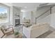 Cozy living room with fireplace and stairs with view of exterior at 306 Mizell Rd, Dorchester, SC 29437