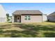 The backyard features a well-maintained lawn, offering ample space for outdoor activities and entertaining at 309 Sedona Dr, Summerville, SC 29486