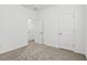 Bedroom with carpet and closet area has multiple doors for privacy and storage at 309 Sedona Dr, Summerville, SC 29486