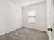 Small bedroom shows carpet flooring, neutral wall color, and a bright window at 309 Sedona Dr, Summerville, SC 29486