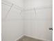 An empty closet with wire shelving and neutral carpet offers plenty of storage space at 309 Sedona Dr, Summerville, SC 29486