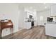 Bright kitchen featuring white cabinets, granite countertops, and modern appliances, perfect for cooking and dining at 309 Sedona Dr, Summerville, SC 29486