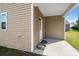 A covered patio on the back of the home offers a comfortable outdoor living space at 309 Sedona Dr, Summerville, SC 29486