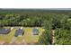 Overhead view of newly built homes boasting spacious yards and nearby wooded areas at 310 Mizell Rd, Dorchester, SC 29437