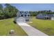 Aerial view of a home with a long driveway and garage at 310 Mizell Rd, Dorchester, SC 29437