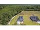 Aerial view showcases the surrounding trees at 310 Mizell Rd, Dorchester, SC 29437