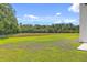 The backyard features a large lawn and natural surroundings at 310 Mizell Rd, Dorchester, SC 29437