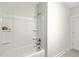Clean bathroom featuring a white tub and shower combo with built-in shelving at 310 Mizell Rd, Dorchester, SC 29437