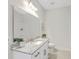 Bathroom featuring a granite vanity, neutral tiling, and modern fixtures at 310 Mizell Rd, Dorchester, SC 29437