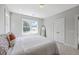 Cozy bedroom featuring carpet, a large bed, double closets and a bright window at 310 Mizell Rd, Dorchester, SC 29437