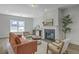 Comfortable living room with a fireplace, neutral walls, and stylish decor at 310 Mizell Rd, Dorchester, SC 29437
