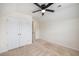 Bright bedroom with neutral carpet, a closet, and an open door to another room at 313 Catawba Branch Way, Moncks Corner, SC 29461