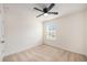 Bedroom with light carpet, one window, white walls, and a ceiling fan at 313 Catawba Branch Way, Moncks Corner, SC 29461