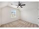 Cozy bedroom with natural light, neutral carpet, ceiling fan, and an attic ceiling at 313 Catawba Branch Way, Moncks Corner, SC 29461