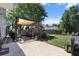 Outdoor patio area with pavers, comfortable wicker furniture and a lovely shade-providing pergola at 346 Cicadas Song, Moncks Corner, SC 29461