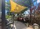 Outdoor patio area with pavers, comfortable wicker furniture and a lovely shade-providing pergola at 346 Cicadas Song, Moncks Corner, SC 29461