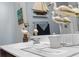 Bathroom vanity featuring stylish fixtures, nautical decor, and ample counter space at 346 Cicadas Song, Moncks Corner, SC 29461