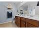 Spacious bathroom with double vanity, blue walls, and nautical decor accents throughout at 346 Cicadas Song, Moncks Corner, SC 29461