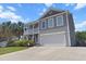 Charming two-story home with a double porch and a two car garage at 346 Cicadas Song, Moncks Corner, SC 29461