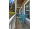 Inviting porch featuring two chairs and wood paneled ceiling at 346 Cicadas Song, Moncks Corner, SC 29461