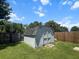 Durable storage shed with double doors and a ramp, providing ample space for tools and equipment in the backyard at 346 Cicadas Song, Moncks Corner, SC 29461