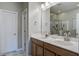Bathroom featuring a double vanity with modern fixtures, an enclosed shower and tile flooring at 3639 Pimmit Pl, Ladson, SC 29456