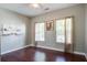 Comfortable bedroom with hardwood floors, natural lighting, and tastefully curated wall decorations at 3639 Pimmit Pl, Ladson, SC 29456