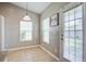 Bright breakfast nook features two windows, neutral paint, tile floors and a modern light fixture at 3639 Pimmit Pl, Ladson, SC 29456