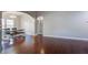 Bright dining area with natural light, features a stylish wooden table and hardwood floors at 3639 Pimmit Pl, Ladson, SC 29456
