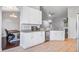 Bright kitchen featuring white cabinets, stainless appliances, granite countertops, tile backsplash and tile flooring at 3639 Pimmit Pl, Ladson, SC 29456
