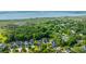 Aerial view of the community with green canopy of mature trees and waterfront views at 3711 Tip Ln, Mount Pleasant, SC 29466