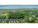Captivating aerial shot showcases this home in a beautiful waterfront community with mature trees and stunning views at 3711 Tip Ln, Mount Pleasant, SC 29466