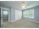 Empty bedroom features large windows, closet and neutral wall color at 3711 Tip Ln, Mount Pleasant, SC 29466