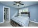 This bedroom features natural lighting, a ceiling fan and a queen sized bed at 3711 Tip Ln, Mount Pleasant, SC 29466
