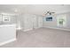 Large bonus room offering flexible living space and featuring plush carpeting and neutral colors at 3711 Tip Ln, Mount Pleasant, SC 29466