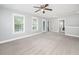 Open bonus room with neutral walls, carpet, lots of natural light, and multiple doorways at 3711 Tip Ln, Mount Pleasant, SC 29466
