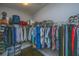 Well-organized walk-in closet with shelving and hanging rods, maximizing storage space for clothing and accessories at 3711 Tip Ln, Mount Pleasant, SC 29466