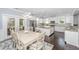 Dining area featuring a designer rug and easy access to both the kitchen and outdoor patio at 3711 Tip Ln, Mount Pleasant, SC 29466
