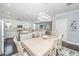 Open floor plan with dining area leading to kitchen and living room, great for entertaining at 3711 Tip Ln, Mount Pleasant, SC 29466