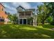 Beautiful blue raised home with a screened porch and backyard at 3711 Tip Ln, Mount Pleasant, SC 29466