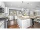 Bright kitchen with stainless appliances, granite counters, wine cooler, and an open floor plan at 3711 Tip Ln, Mount Pleasant, SC 29466