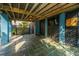 Relaxing outdoor patio space with a ceiling fan and stylish lattice enclosure at 3711 Tip Ln, Mount Pleasant, SC 29466