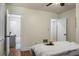 Bright bedroom shows open bathroom and closet at 3935 Walnut St, North Charleston, SC 29405