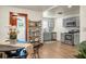 Charming eat-in kitchen features gray cabinetry, stainless appliances, and sliding door at 3935 Walnut St, North Charleston, SC 29405