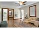 Open living room featuring hardwood floors and natural light at 3935 Walnut St, North Charleston, SC 29405