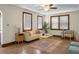 Bright living room with hardwood floors, neutral walls, and stylish furniture at 3935 Walnut St, North Charleston, SC 29405